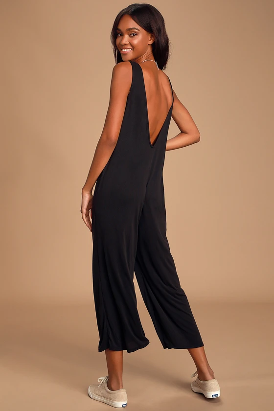 https://www.styched.in/cdn/shop/products/BlackVNeckComfyJumpsuit_2.png?v=1646375722&width=1445
